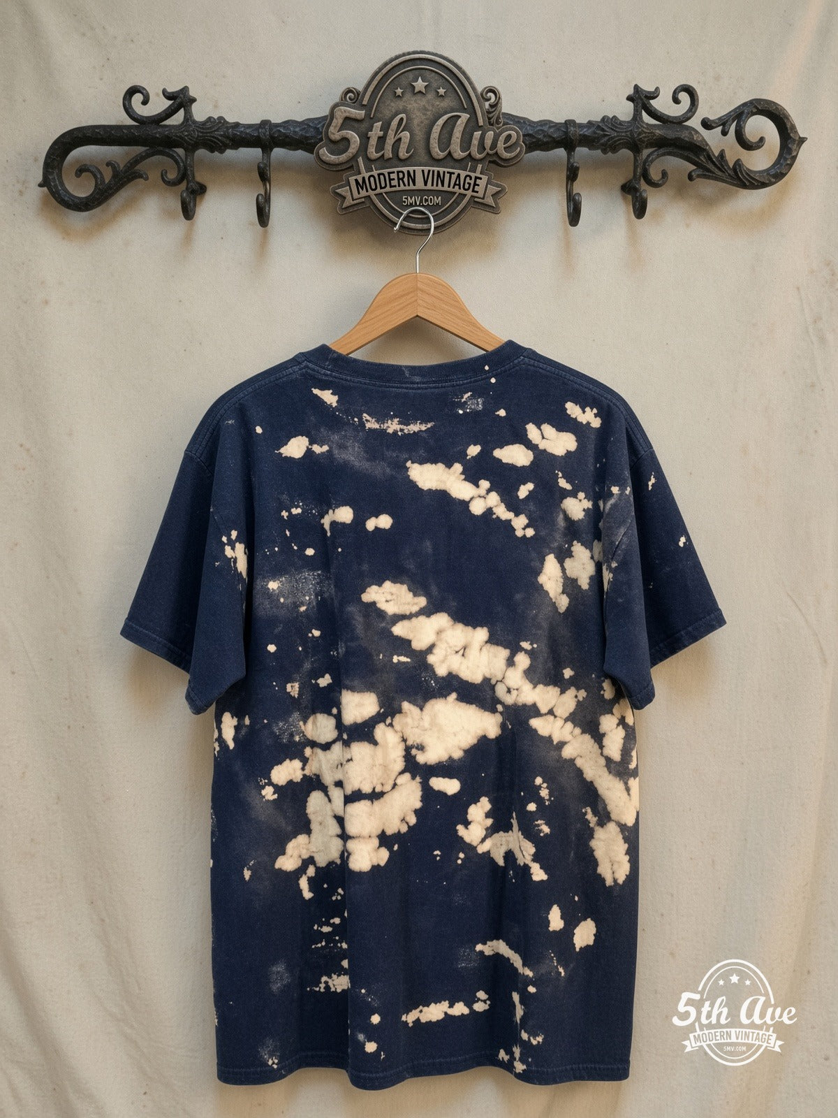 Elvis Presley – King of Rock and Roll – All Over Print – Vintage Band T-Shirt — back on locked cream ornate 5th Ave rack