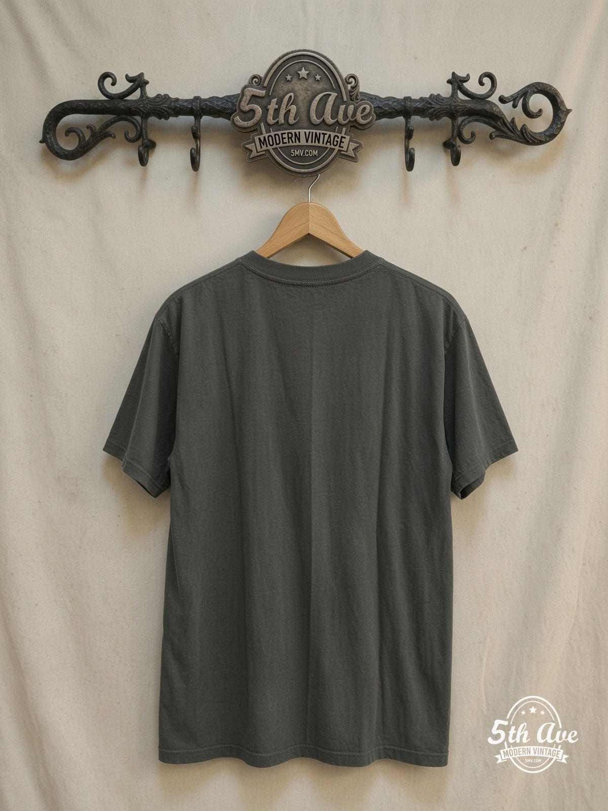 Black Sabbath Captain Boot single stitch T-Shirt – Vintage Band T-Shirt — back on locked cream ornate 5th Ave rack