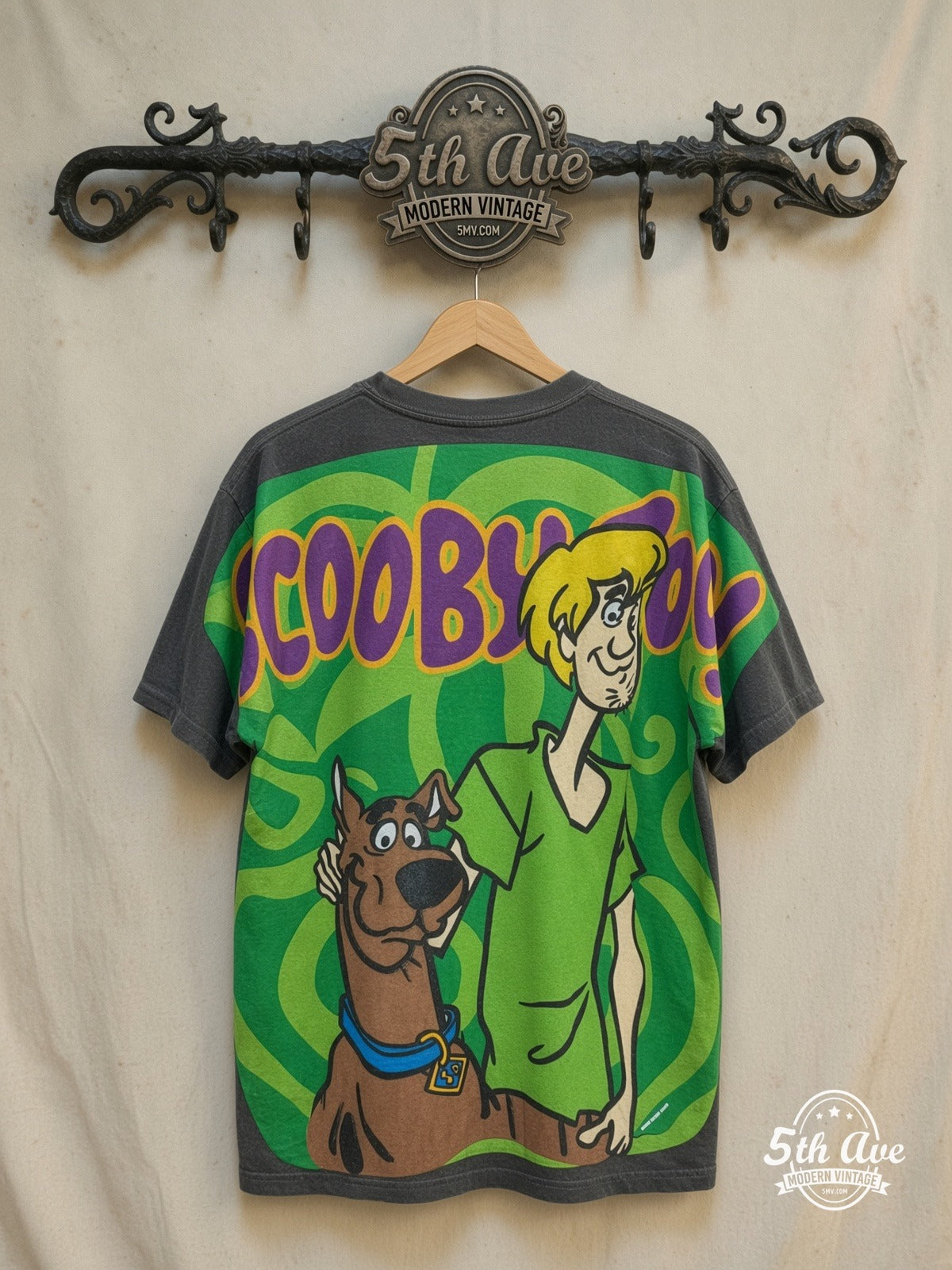 Scooby-Doo – All-Over Print Graphic – New Vintage Graphic Tee — back on locked cream ornate 5th Ave rack