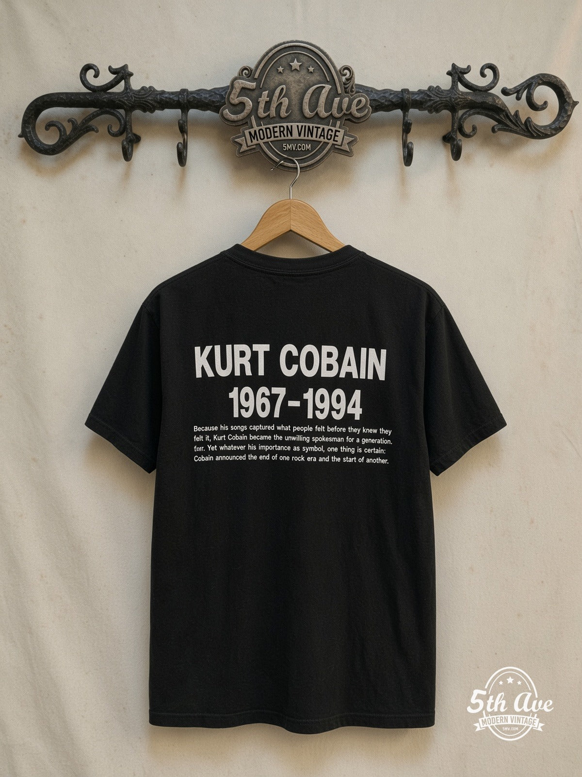 Nirvana – Memorial – Vintage Band T-Shirt — back on locked cream ornate 5th Ave rack