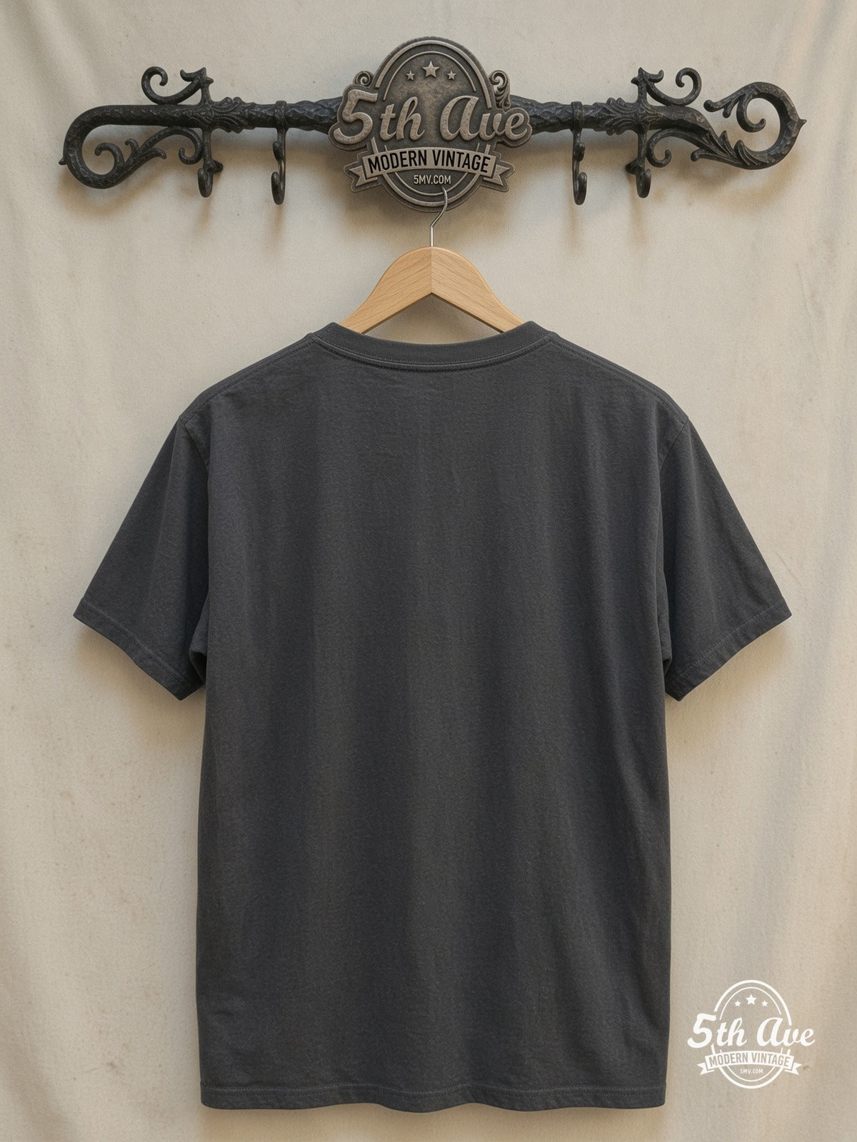 Nirvana – with Kurt Cobain's Sub Pop Records Sketch – Vintage Band T-Shirt — back on locked cream ornate 5th Ave rack