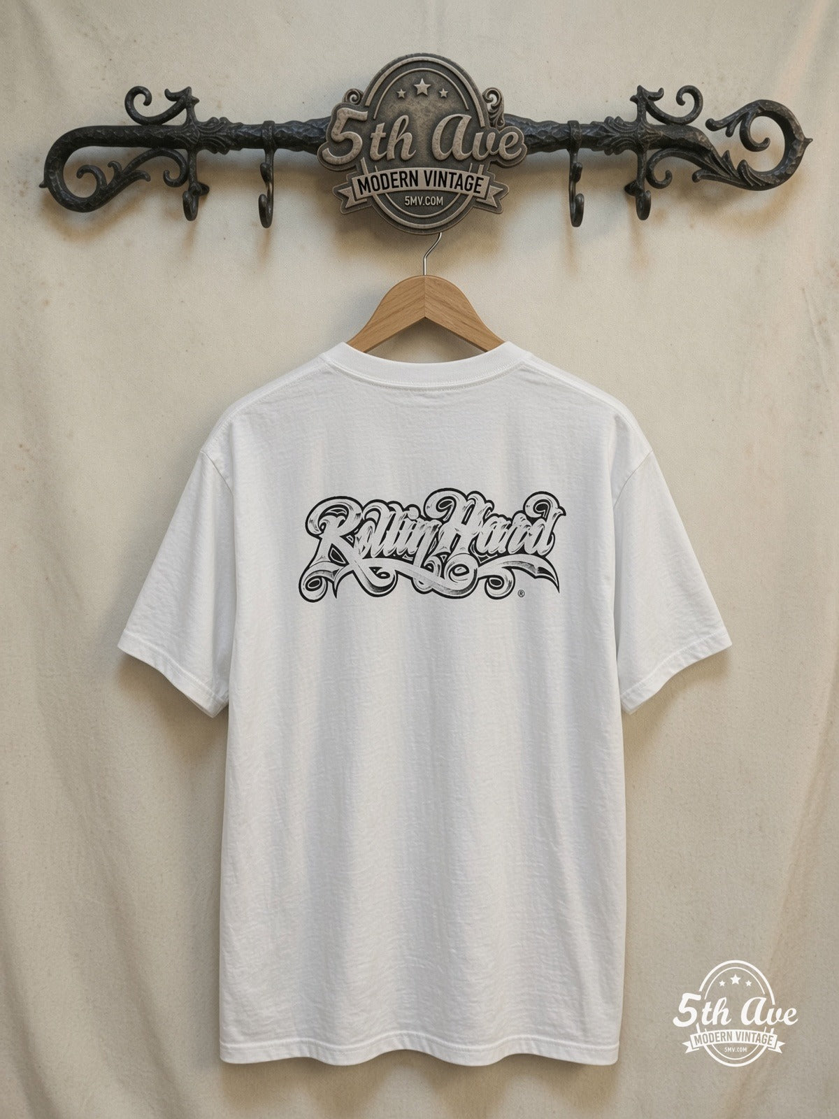 Rollin Hard – '65 Impala Lowrider – Vintage Graphic Tee — back on locked cream ornate 5th Ave rack