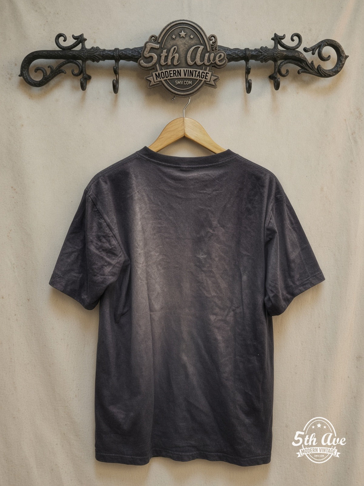 Faded Noir: The Ultimate Guns N' Roses Vintage-Feel Streetwear Tee – Vintage Band T-Shirt — back on locked cream ornate 5th Ave rack