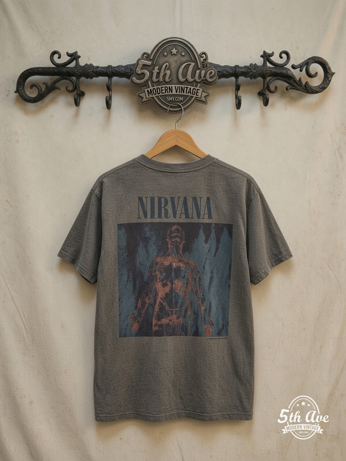 Nirvana Sliver T-Shirt — back on locked cream ornate 5th Ave rack