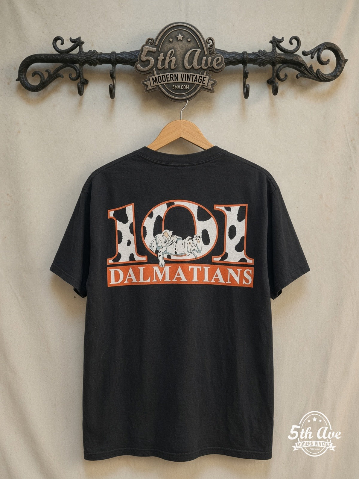 101 Dalmatians – 101 Puppies Pile – New Vintage Graphic Tee — back on locked cream ornate 5th Ave rack