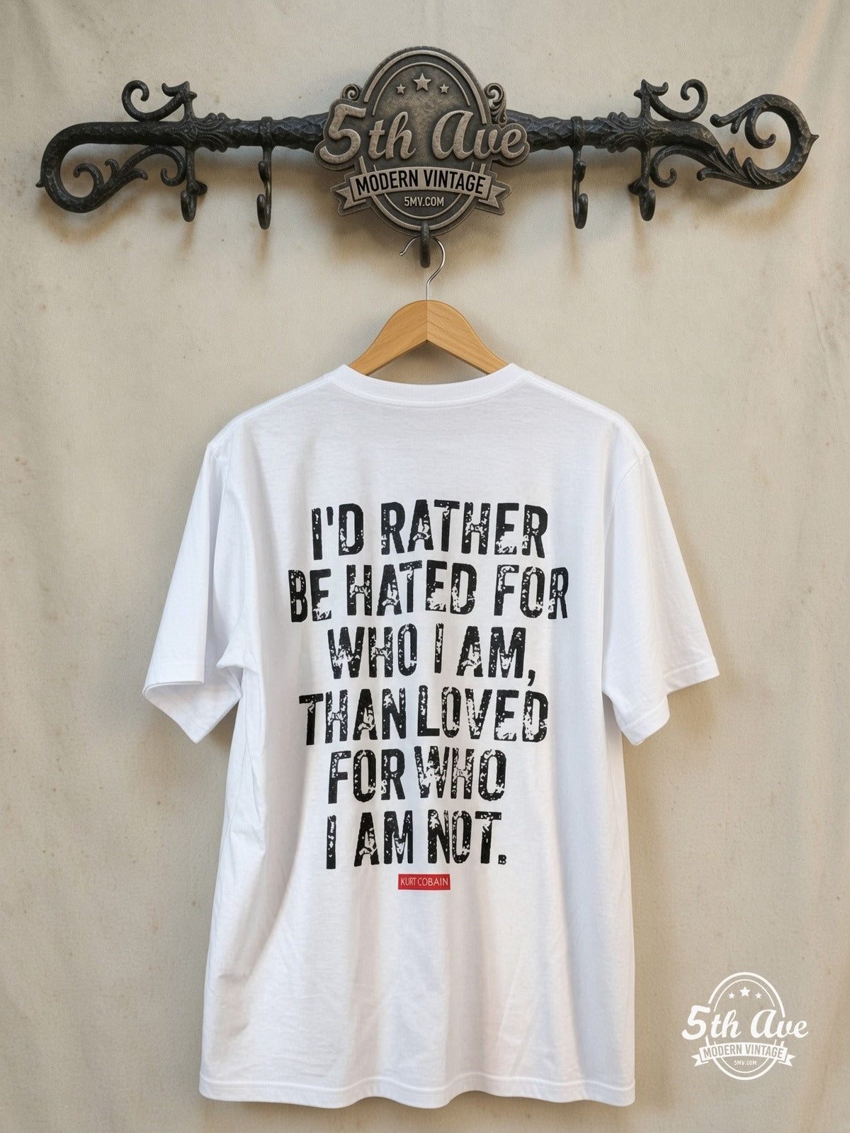 Kurt Cobain – Iconic Quote – Vintage Band T-Shirt — back on locked cream ornate 5th Ave rack