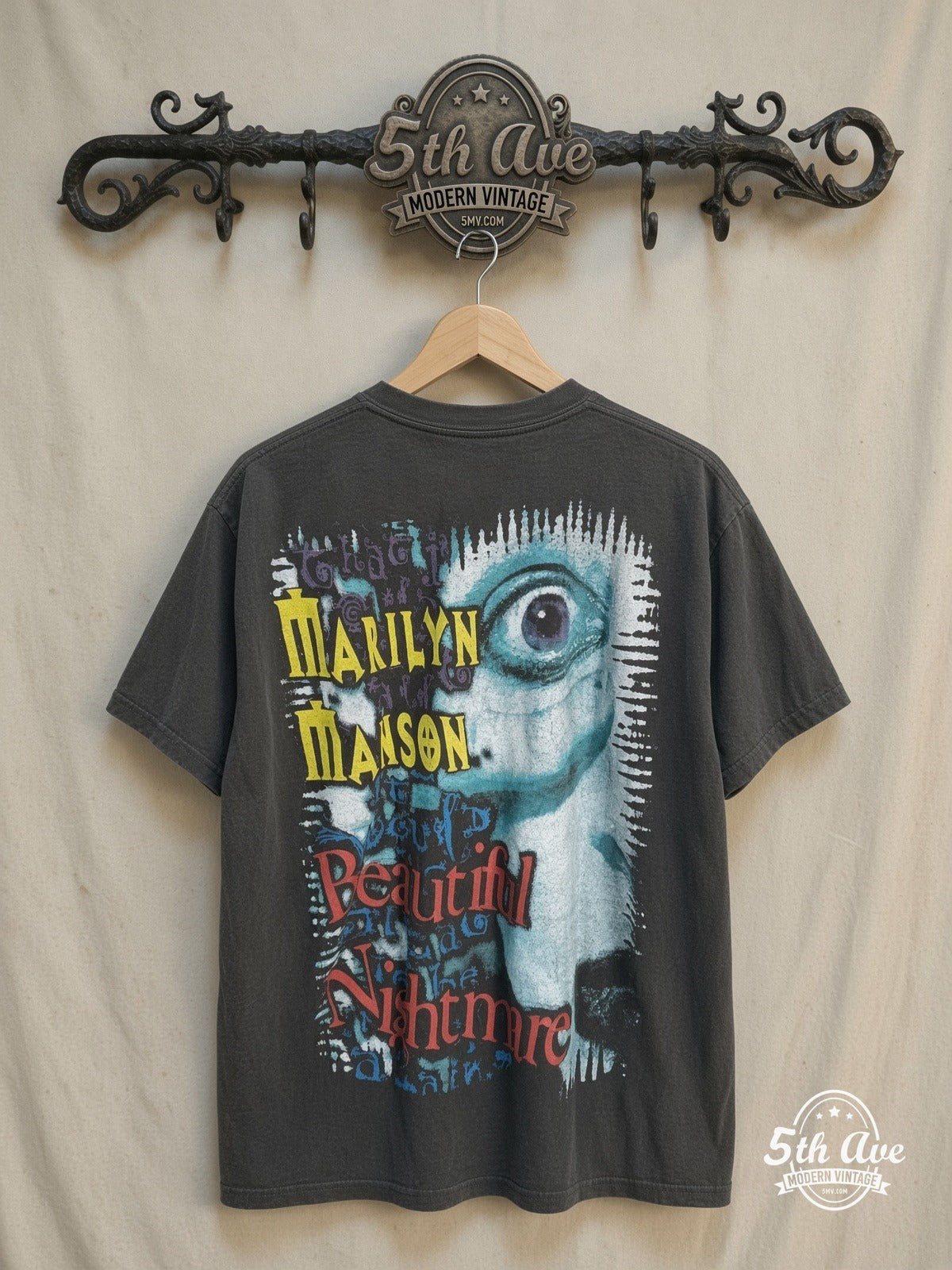 Marilyn Manson – Mechanical Animals Blue Lips – Vintage Band T-Shirt — back on locked cream ornate 5th Ave rack