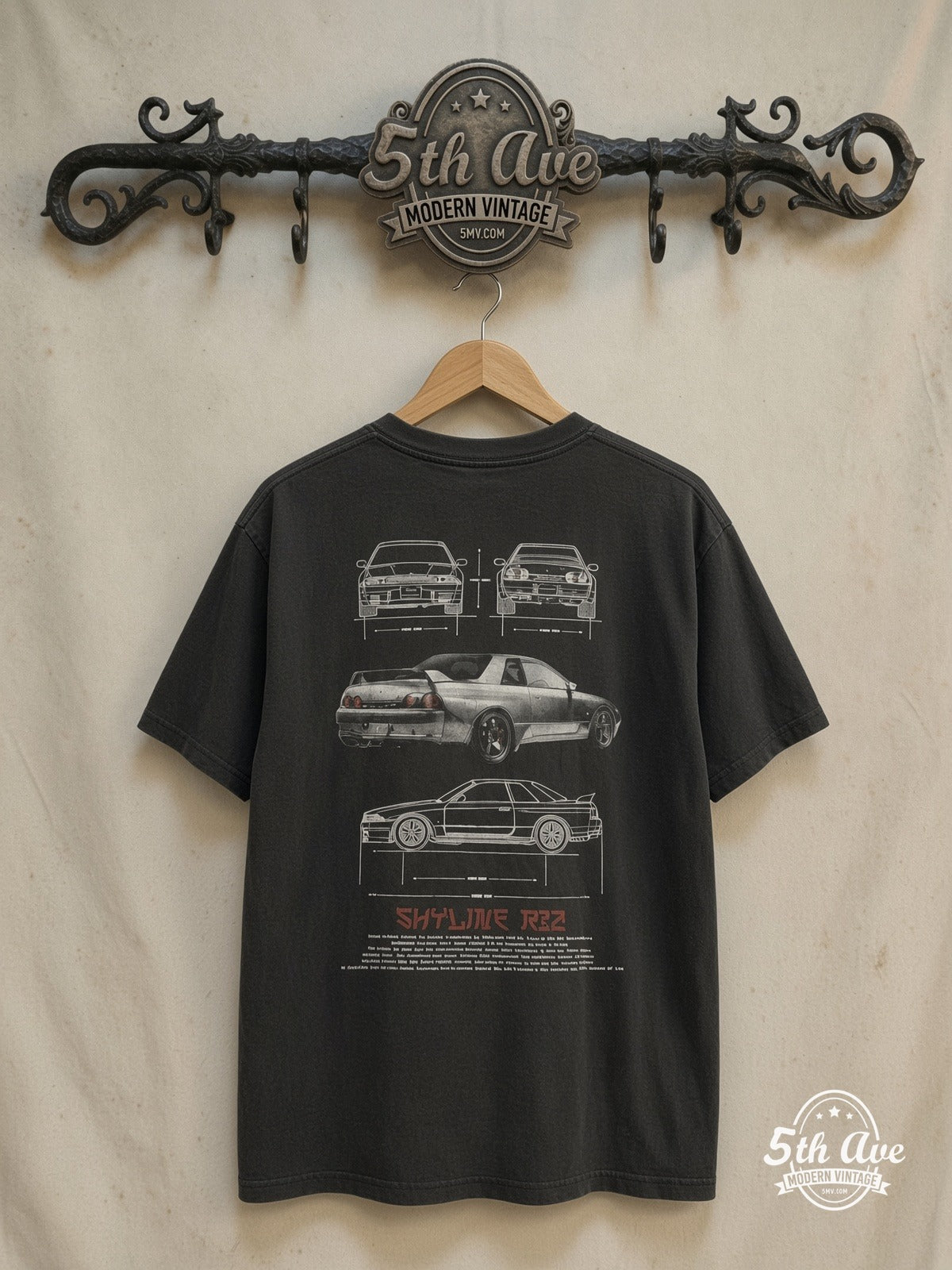 R32 skyline T-Shirt — back on locked cream ornate 5th Ave rack