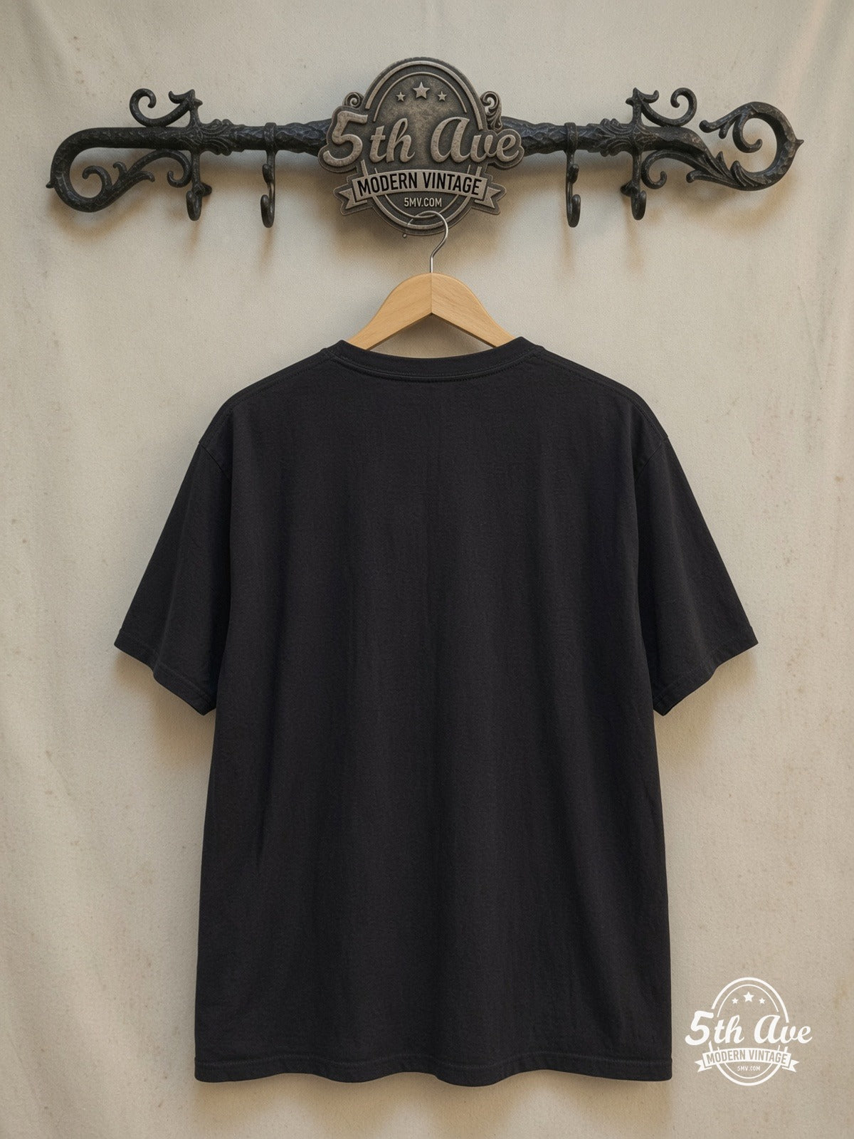 Oasis – Be Here Now – Vintage Band T-Shirt — back on locked cream ornate 5th Ave rack