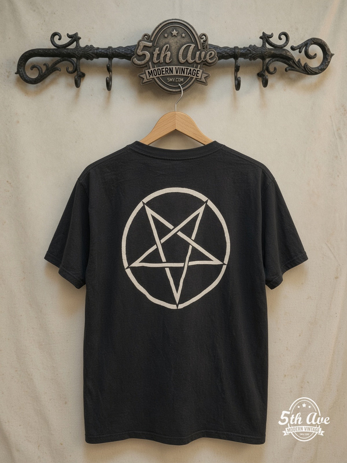 Eclipsing Legacies: Unveiling the Bathory Enigma t shirt – Vintage Band T-Shirt — back on locked cream ornate 5th Ave rack