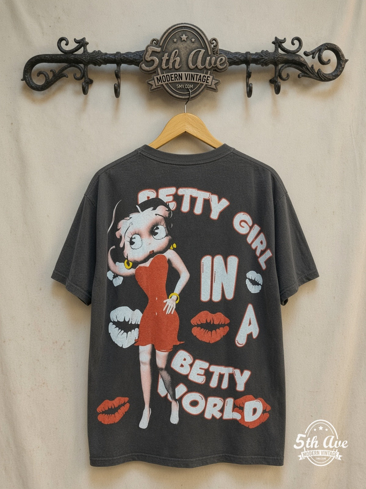 Betty Boop I'm a Betty Girl graphic tee, back view on a display rack
