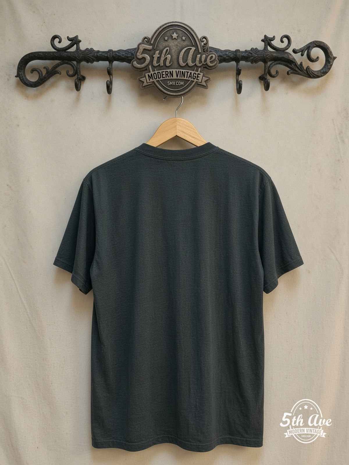 The Allman Brothers Band – Mushroom Logo Orange Gradient Text – Vintage Band T-Shirt — back on locked cream ornate 5th Ave rack