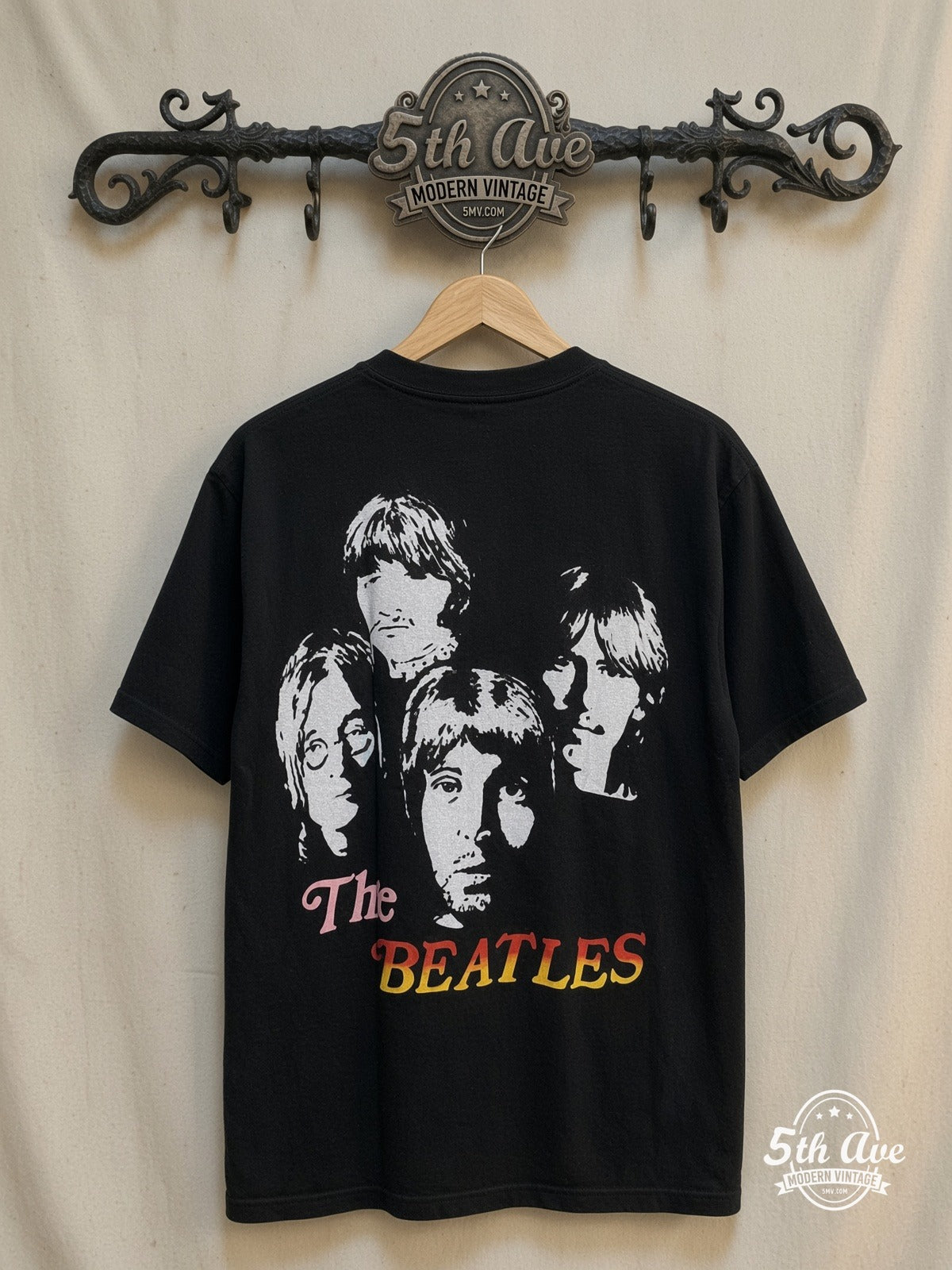 The Beatles – Union Jack Red Logo Mop-Top – Vintage Band T-Shirt — back on locked cream ornate 5th Ave rack