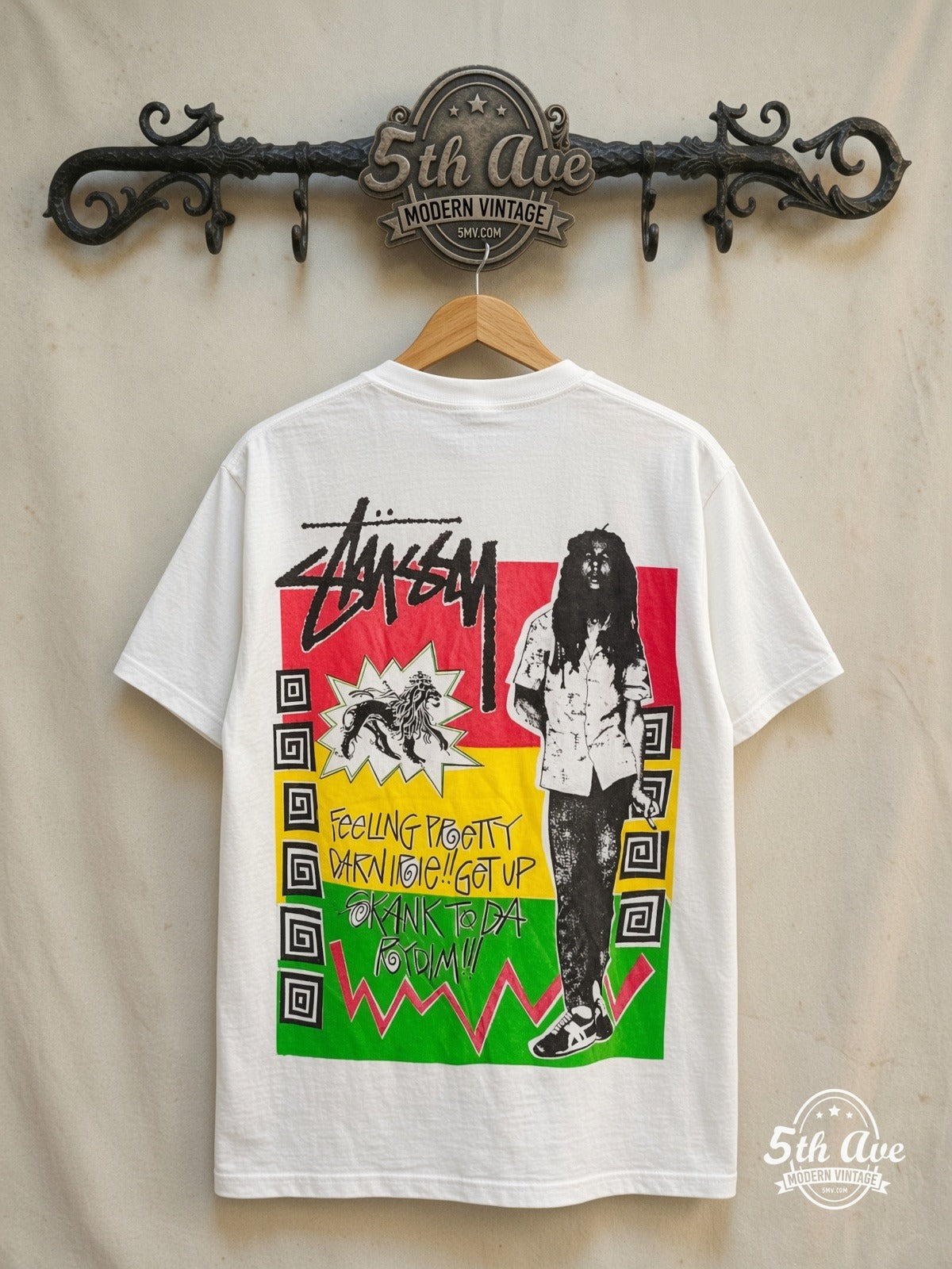Bob Marley – X Stüssy – Vintage Band T-Shirt — back on locked cream ornate 5th Ave rack