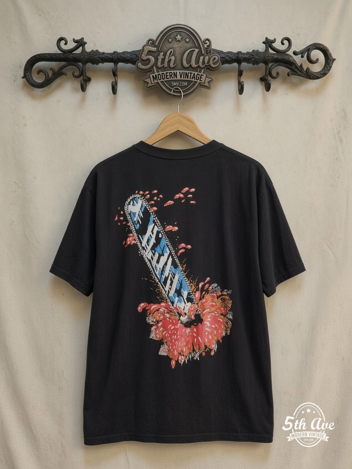 Texas Chainsaw Massacre movie tee, back view on a display rack
