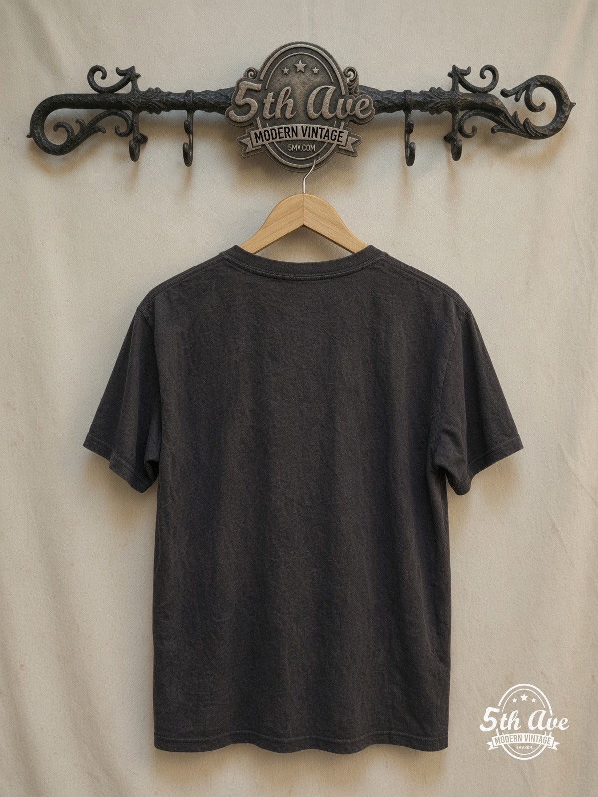 FREDDIE MERCURY 100% Cotton New Vintage Band T-Shirt – Vintage Band T-Shirt — back on locked cream ornate 5th Ave rack