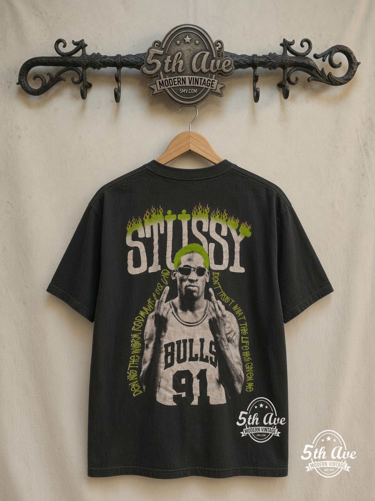 Dennis Rodman x Stüssy – Neon Green The Worm – Vintage Band T-Shirt — back on locked cream ornate 5th Ave rack