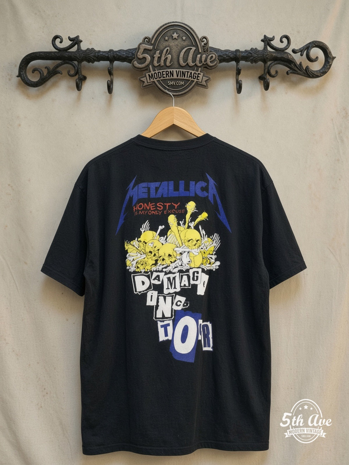 Metallica – Damage, Inc. Tour – Vintage Band T-Shirt — back on locked cream ornate 5th Ave rack