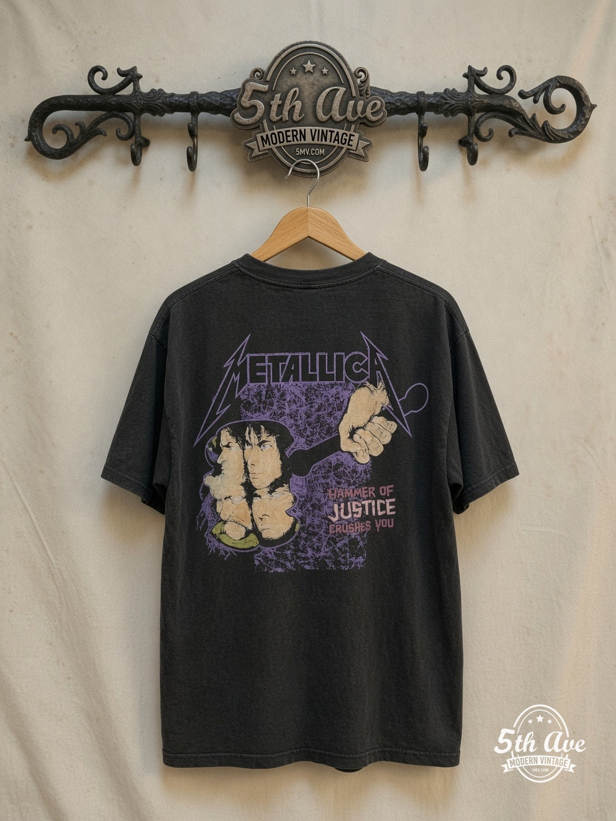 Metallica – And Justice for All Hammer of Justice – Vintage Band T-Shirt — back on locked cream ornate 5th Ave rack