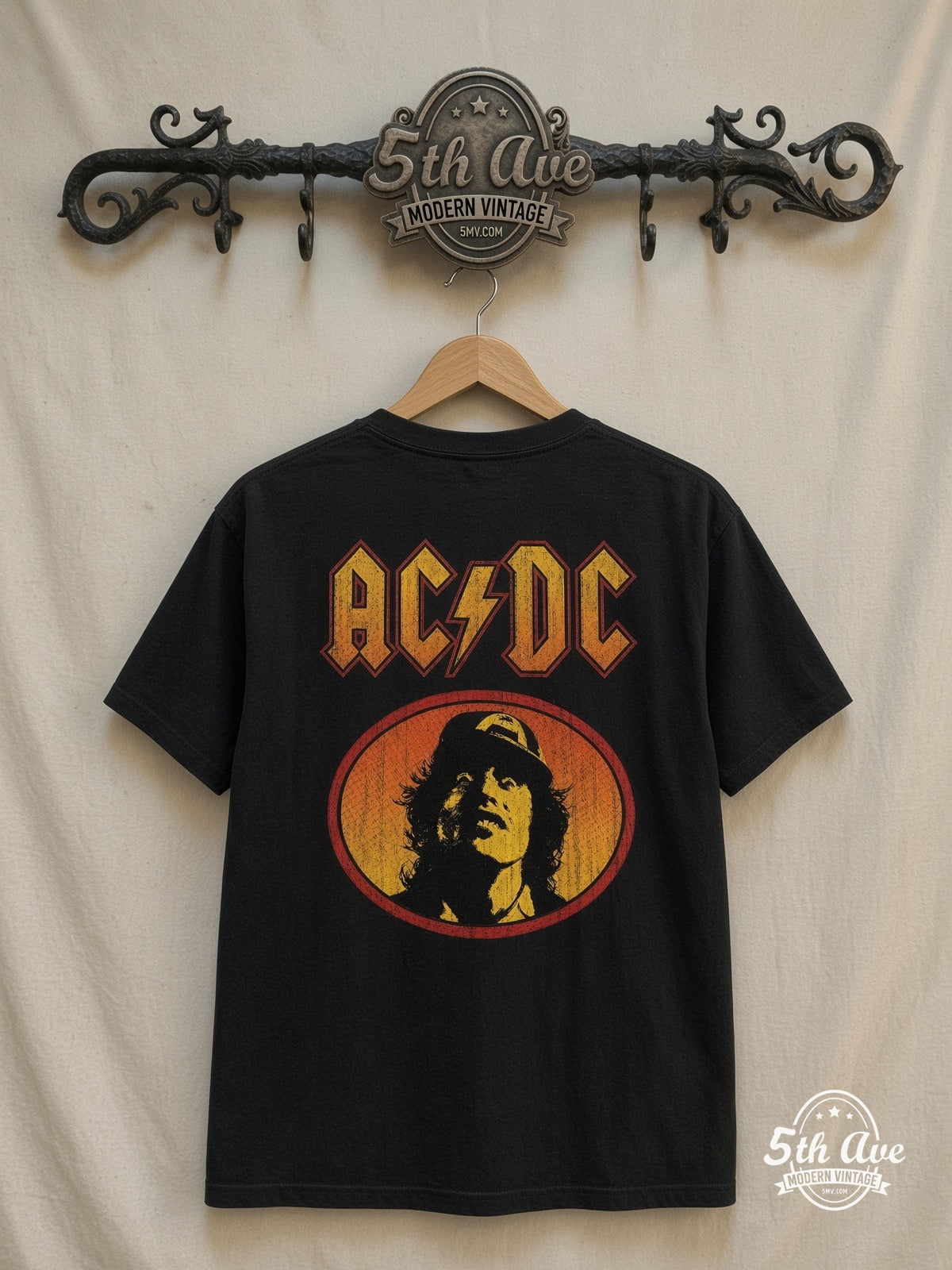 AC/DC – Angus Young Oval – Vintage Band T-Shirt — back on locked cream ornate 5th Ave rack