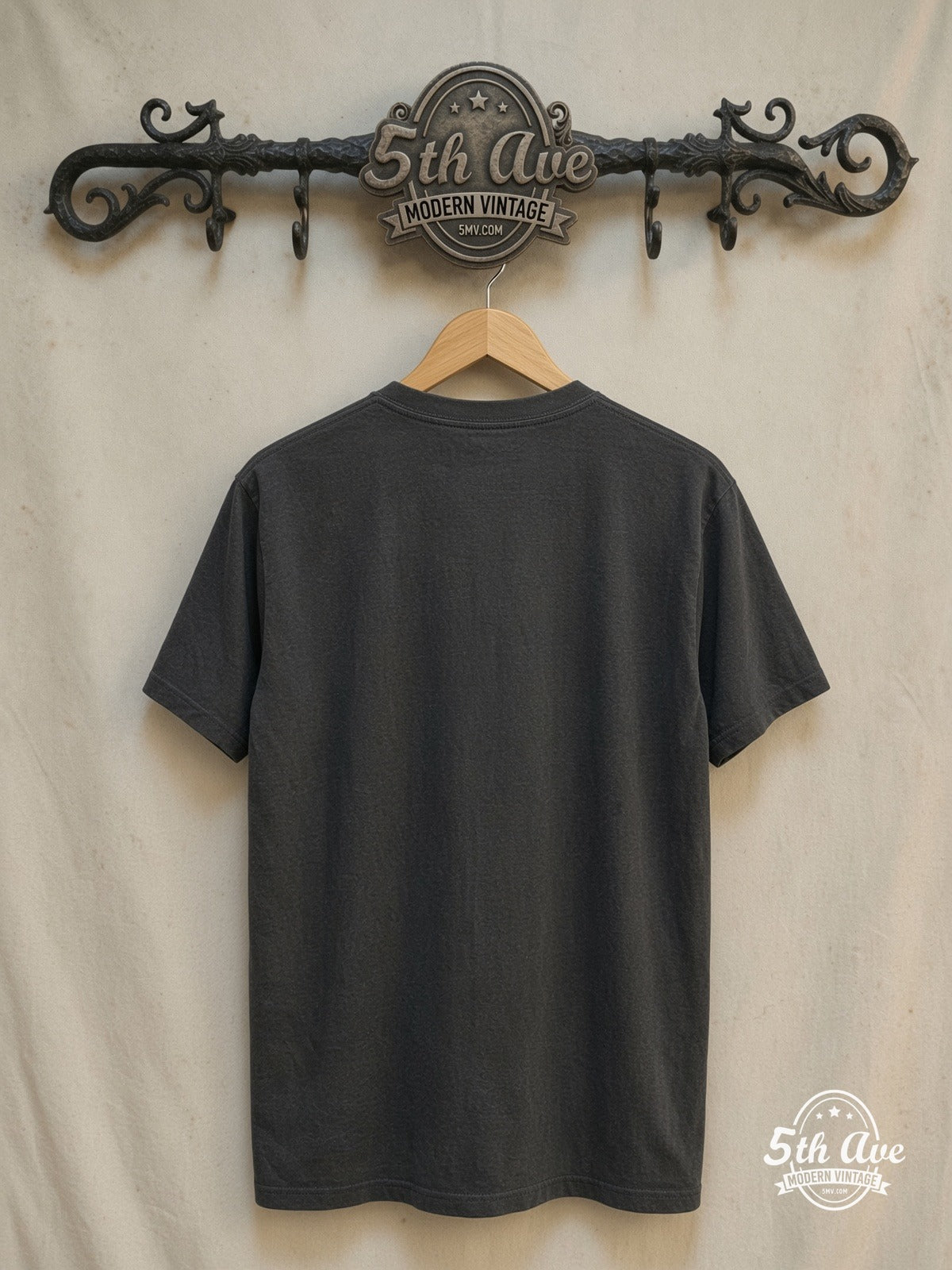 Black Sabbath – Paranoid – Vintage Band T-Shirt — back on locked cream ornate 5th Ave rack