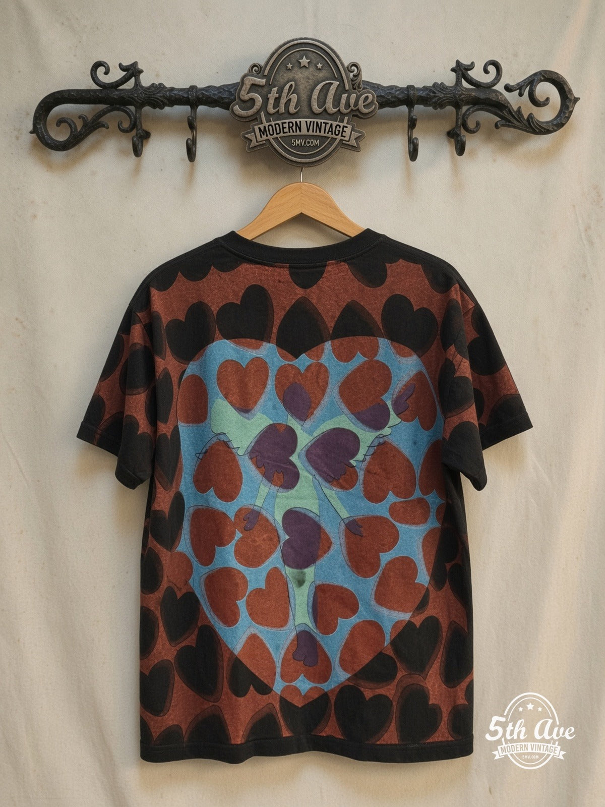 Nirvana – Heart-Shaped Box All Over Print T-Shirt – Vintage Band T-Shirt — back on locked cream ornate 5th Ave rack