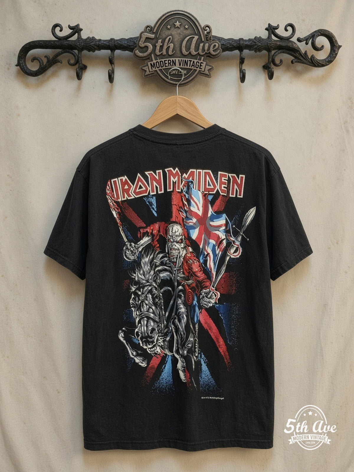 Iron Maiden – 100% Cotton New Vintage Band T-Shirt – Vintage Band T-Shirt — back on locked cream ornate 5th Ave rack