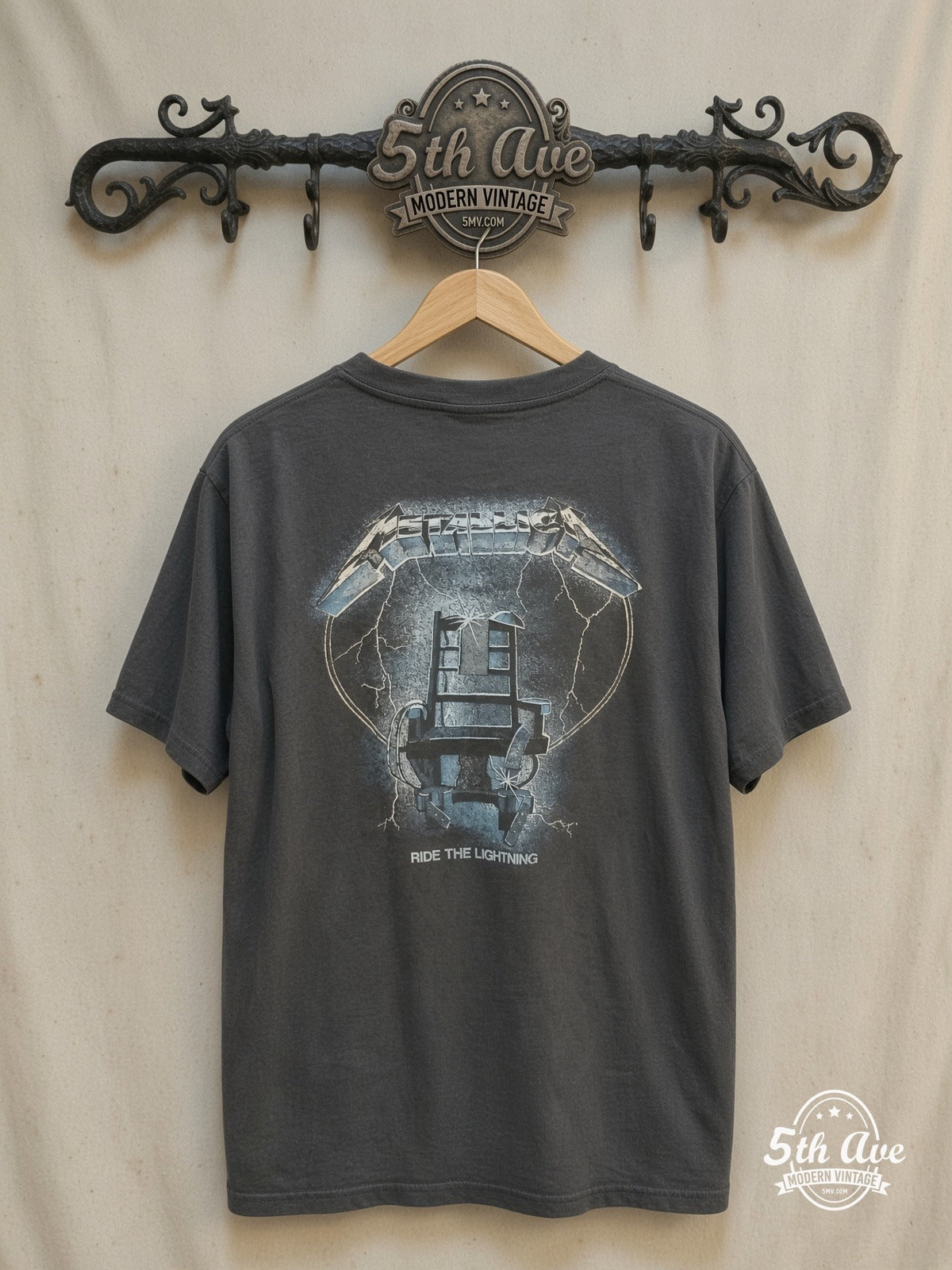 Metallica – Ride the Lightning' Monster Beast and Electric Chair Cotton – Vintage Band T-Shirt — back on locked cream ornate 5th Ave rack