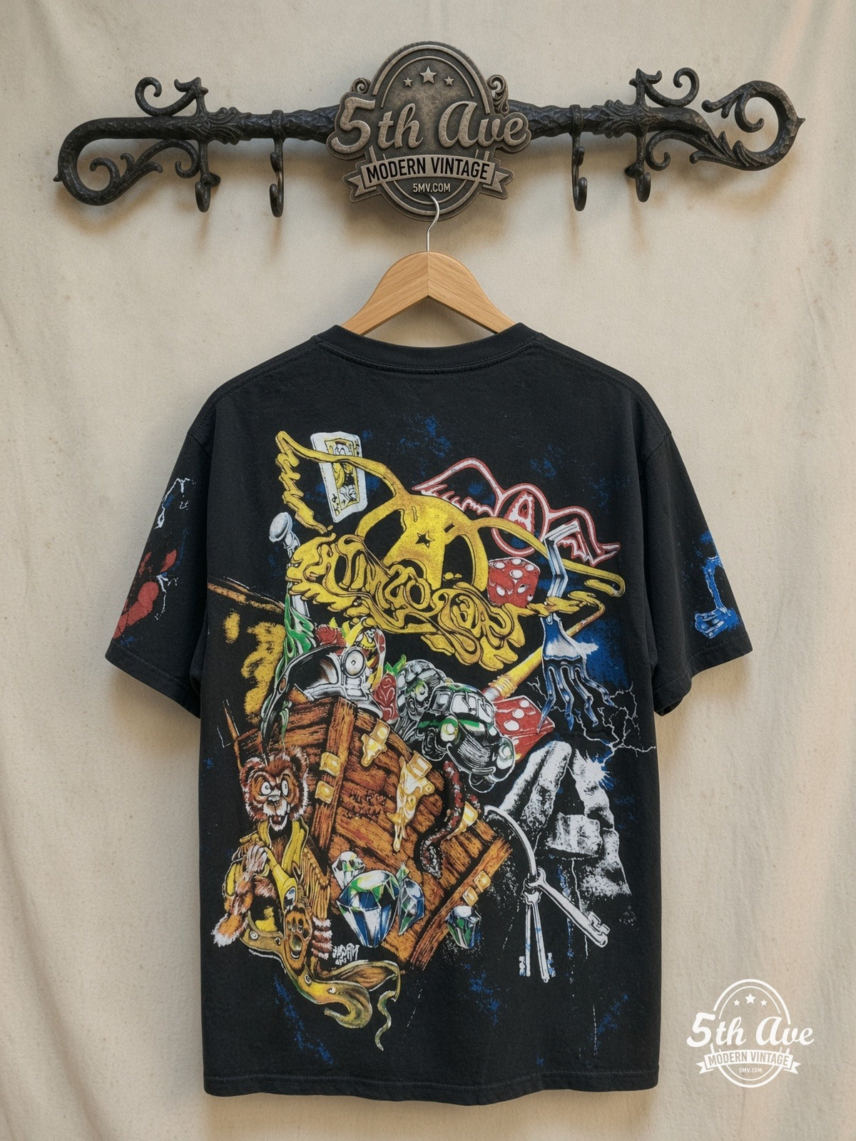 Aerosmith – Aerosmith's Rockin' Journey – All Over Print – Vintage Band T-Shirt — back on locked cream ornate 5th Ave rack