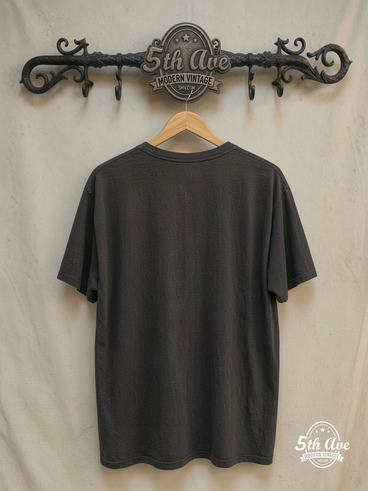 Queen – Color Crest Orange Logo – Vintage Band T-Shirt — back on locked cream ornate 5th Ave rack