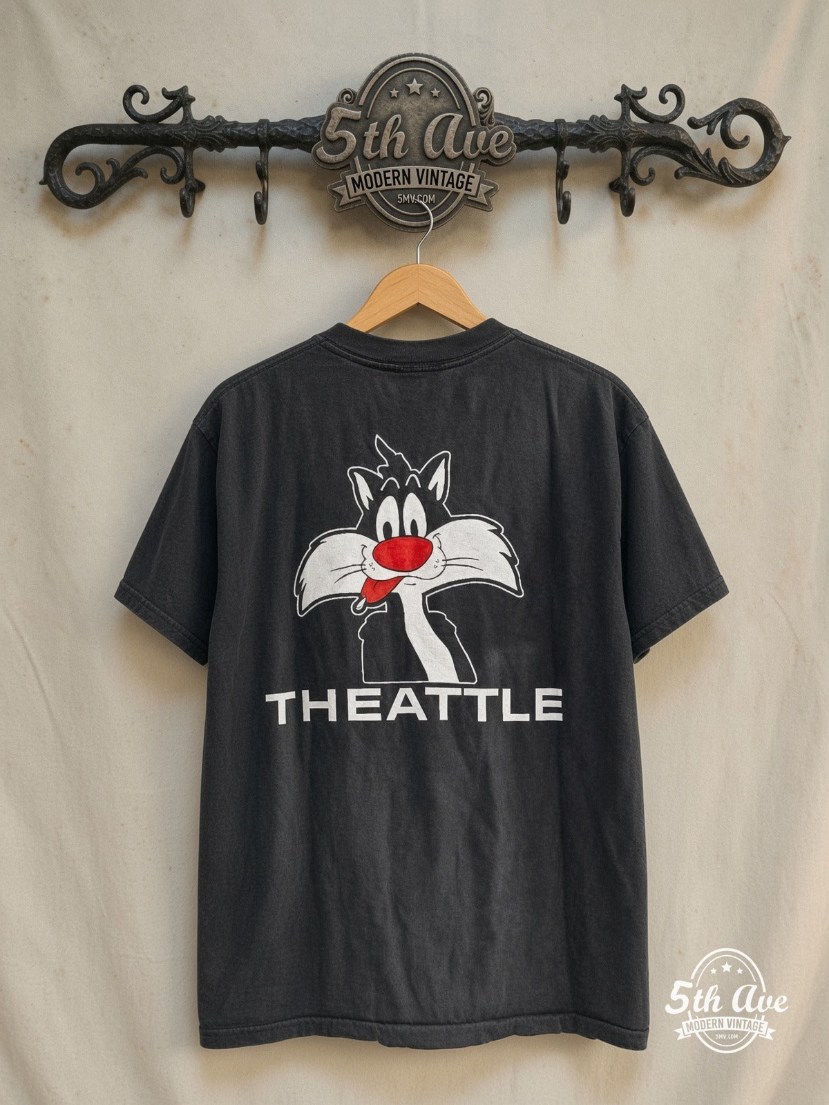 Looney Tunes Sylvester No Fur graphic tee in black, back view on a display rack