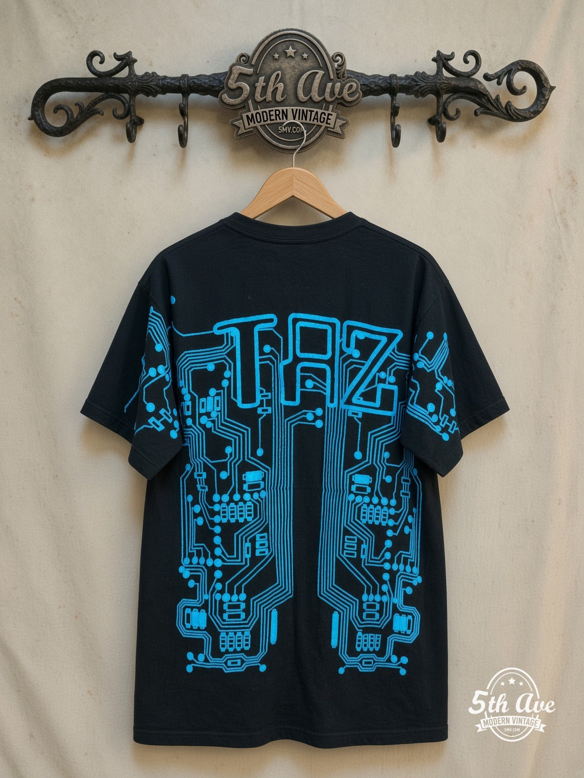 Looney Tunes – Taz-Mania Hi-Tech Taz – All Over Print – New Vintage Graphic Tee — back on locked cream ornate 5th Ave rack