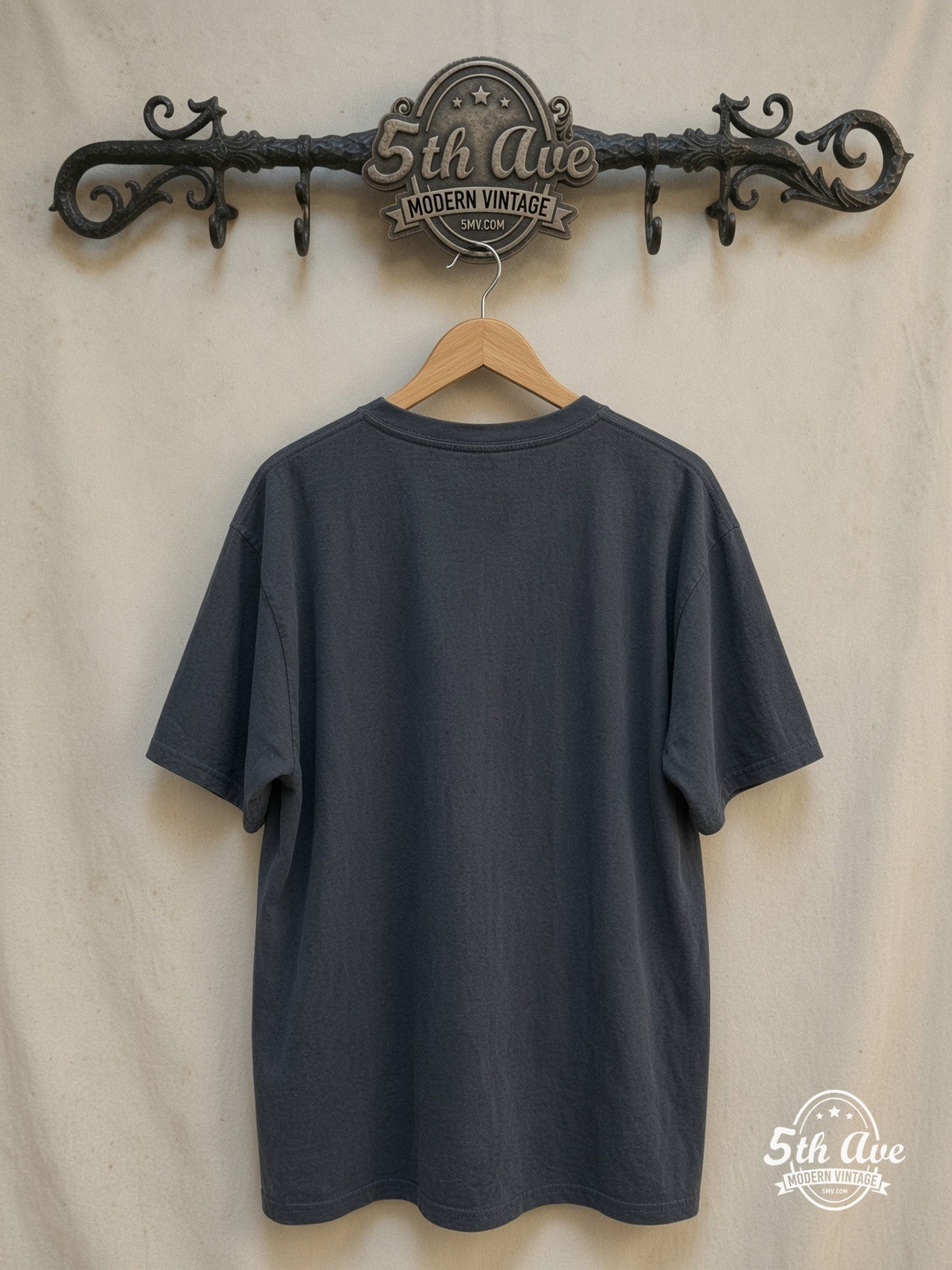 New Order – Vibrant Collage – Vintage Band T-Shirt — back on locked cream ornate 5th Ave rack