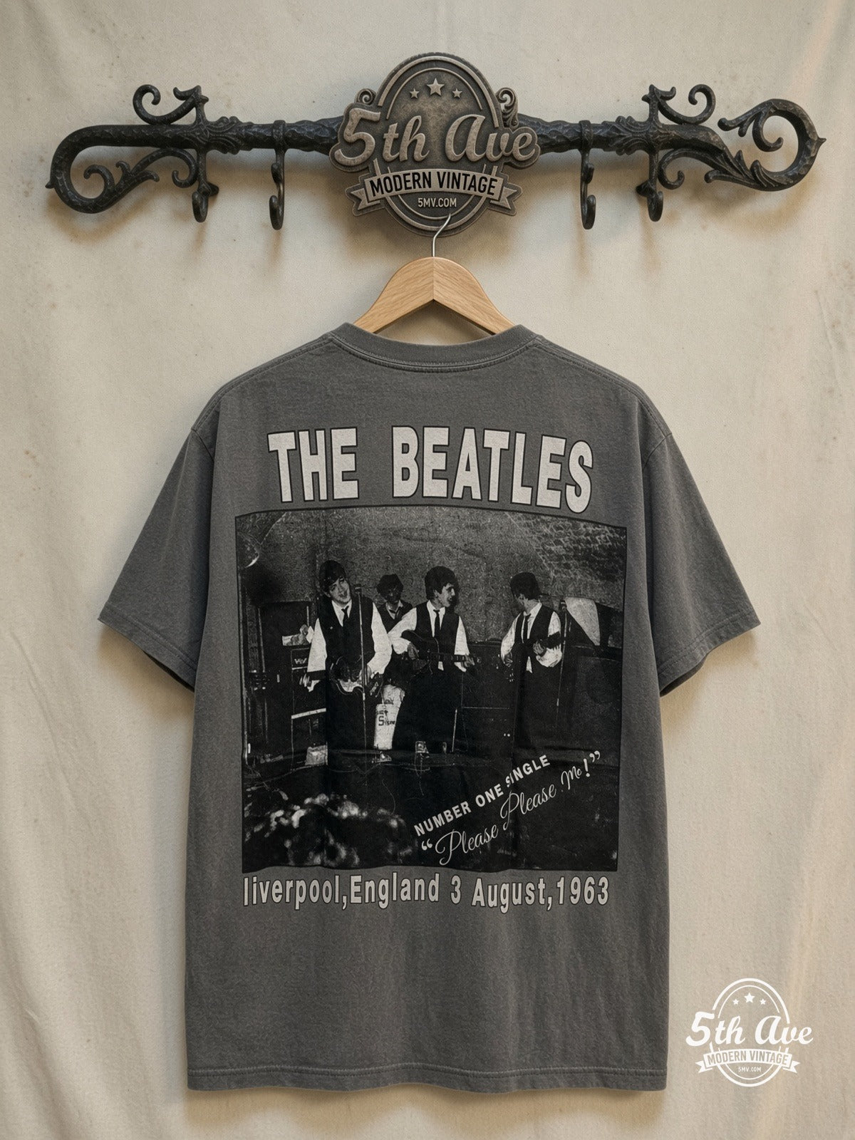 The Beatles – Yellow Bubble Font Early Photo – Vintage Band T-Shirt — back on locked cream ornate 5th Ave rack