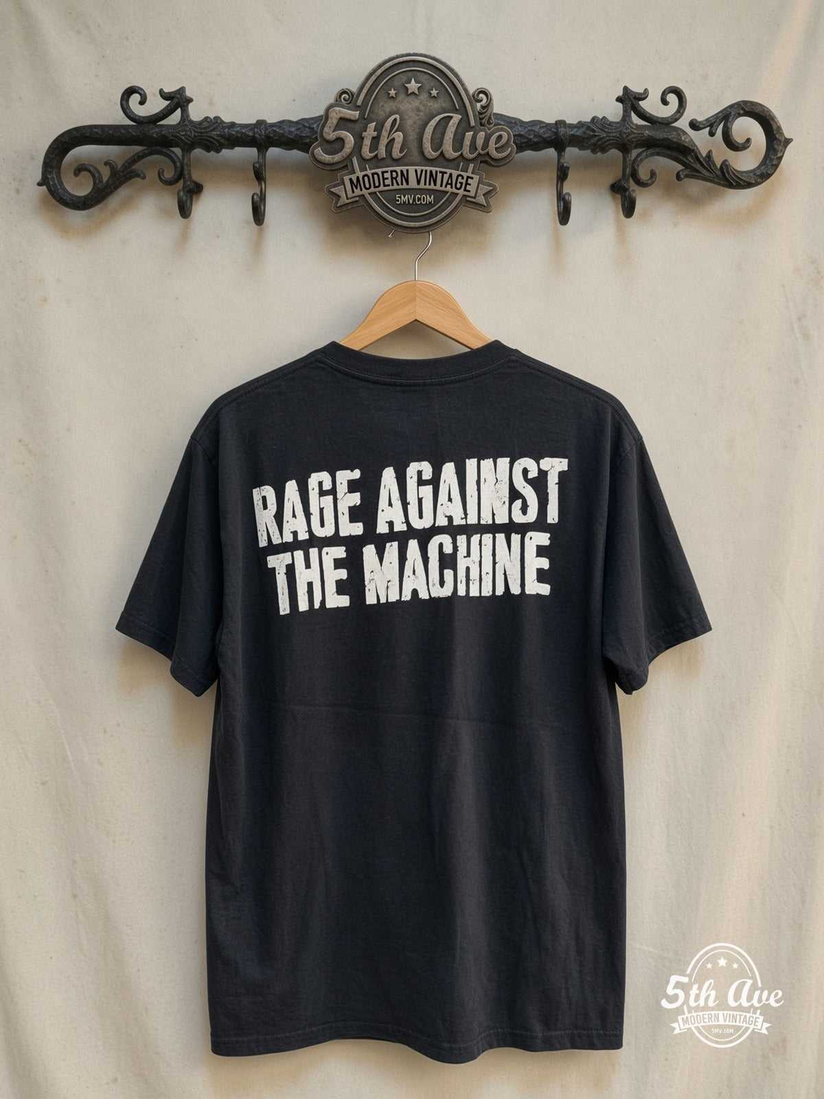 Rage Against the Machine – Vintage Band T-Shirt — back on locked cream ornate 5th Ave rack