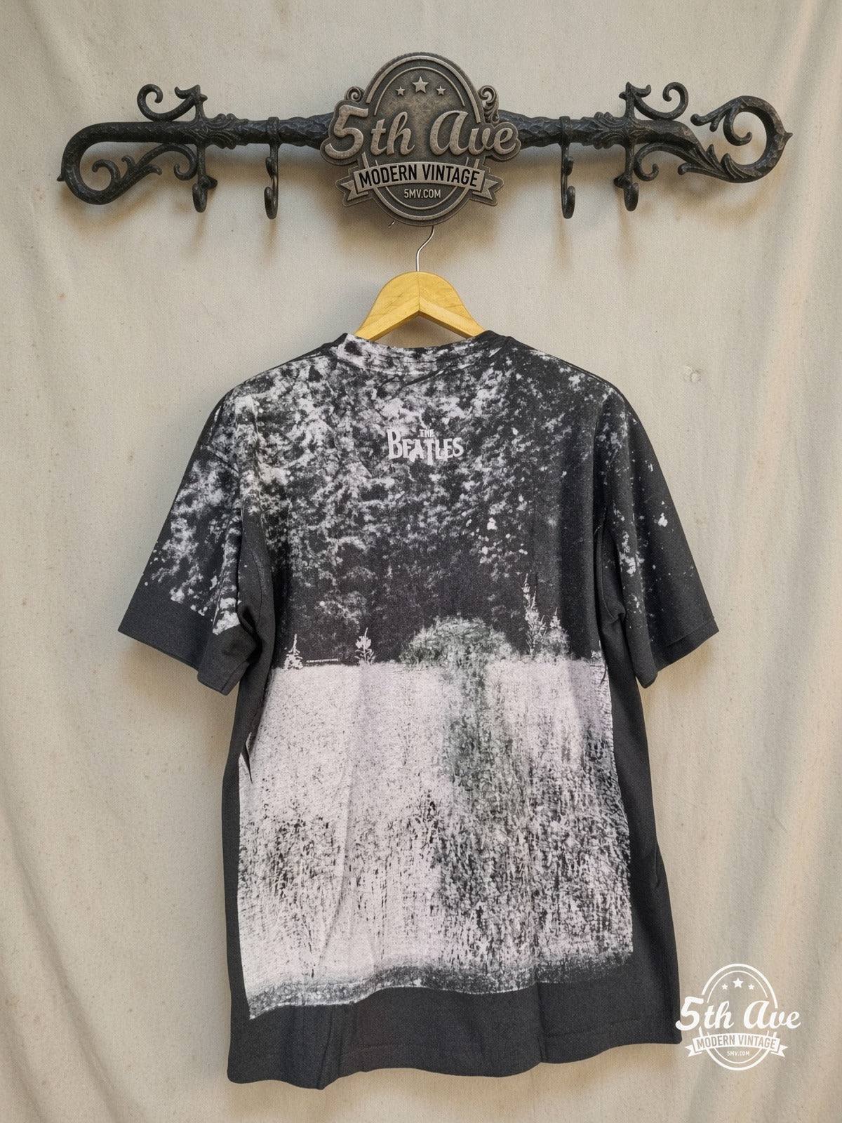 The Beatles – Field Portrait Bleached Shoulders – Vintage Band T-Shirt — back on locked cream ornate 5th Ave rack