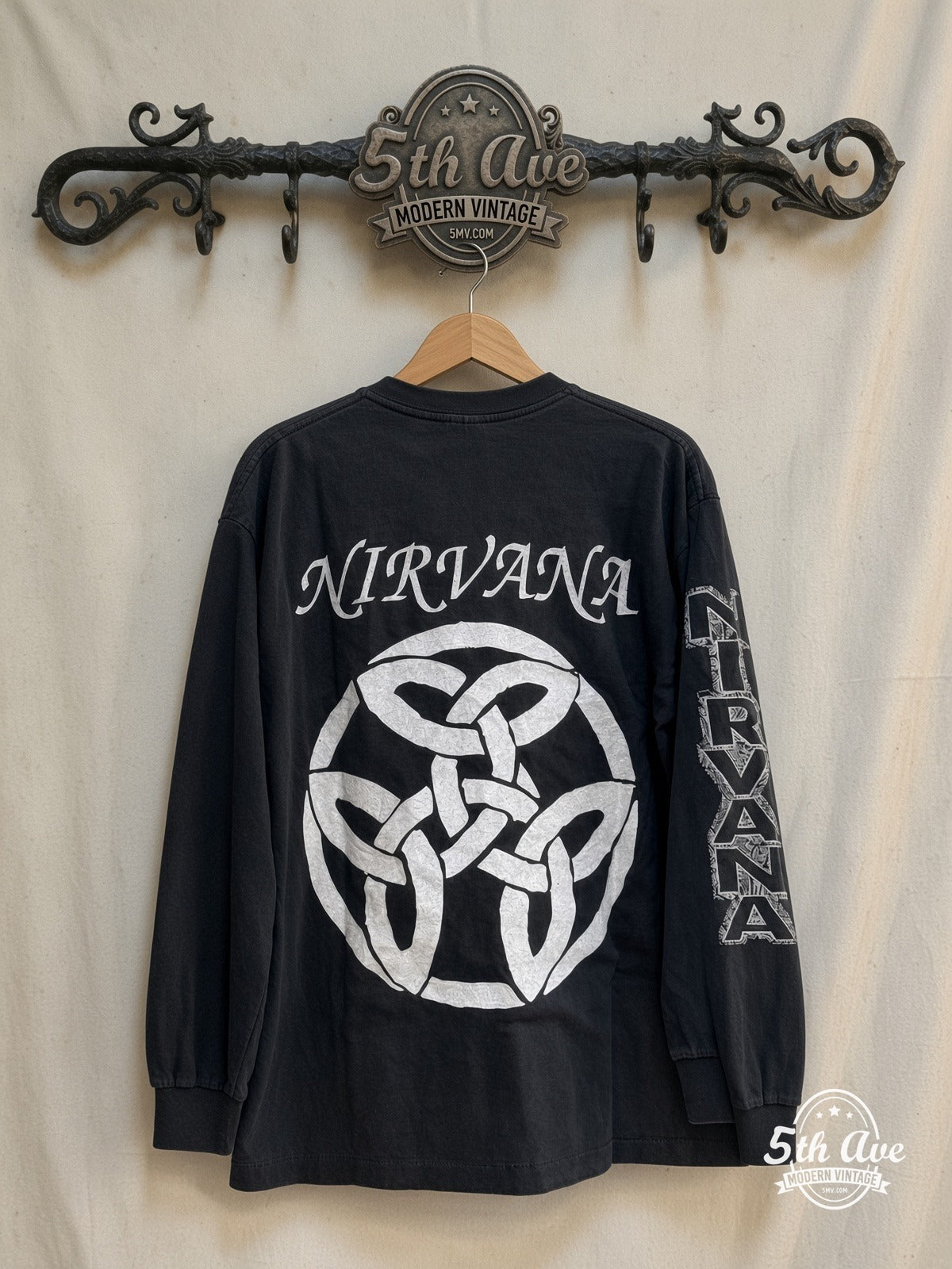 Nirvana – 1987-1994 Band Portraits Long Sleeve – Vintage Band T-Shirt — back on locked cream ornate 5th Ave rack