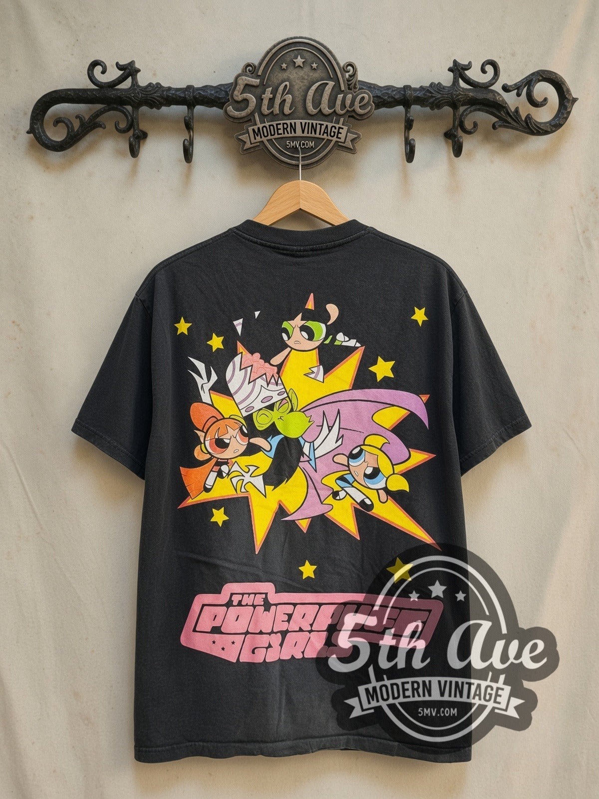 The Powerpuff Girls Professor Utonium and the Powerpuff Girls vintage cartoon tee in black, back view on a display rack
