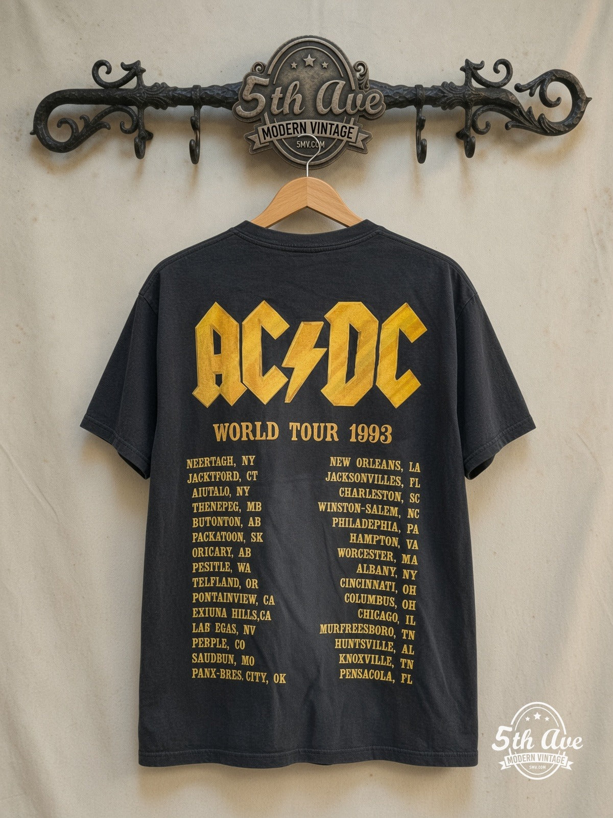 AC/DC – Givin the Dog a Bone World Tour 1993 – Vintage Band T-Shirt — back on locked cream ornate 5th Ave rack