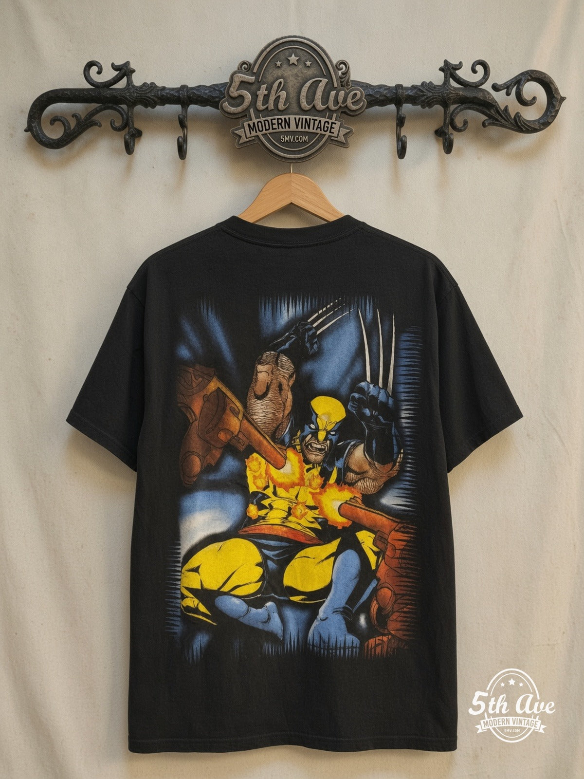 Marvel Wolverine – All Over Print T-Shirt – Vintage Graphic Tee — back on locked cream ornate 5th Ave rack