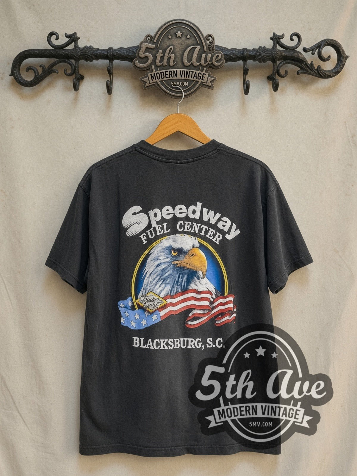Speedway Fuel Center I'll Be Home Early vintage graphic tee in black, back view on a display rack