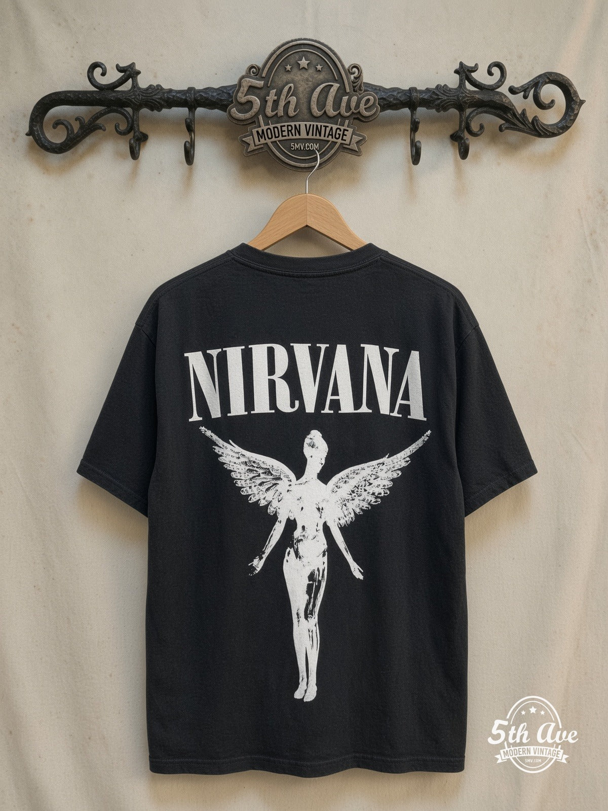 Nirvana – In Utero Glow in the Dark – Vintage Band T-Shirt — back on locked cream ornate 5th Ave rack