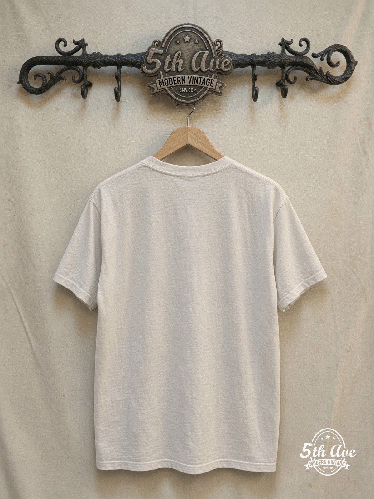The Beatles – Early Era Live Stage Photo – Vintage Band T-Shirt back on locked cream ornate 5th Ave rack