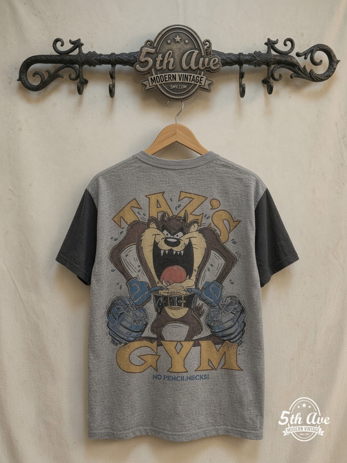 Taz – Taz's Gym No Pencilnecks White Tee – New Vintage Graphic Tee — back on locked cream ornate 5th Ave rack
