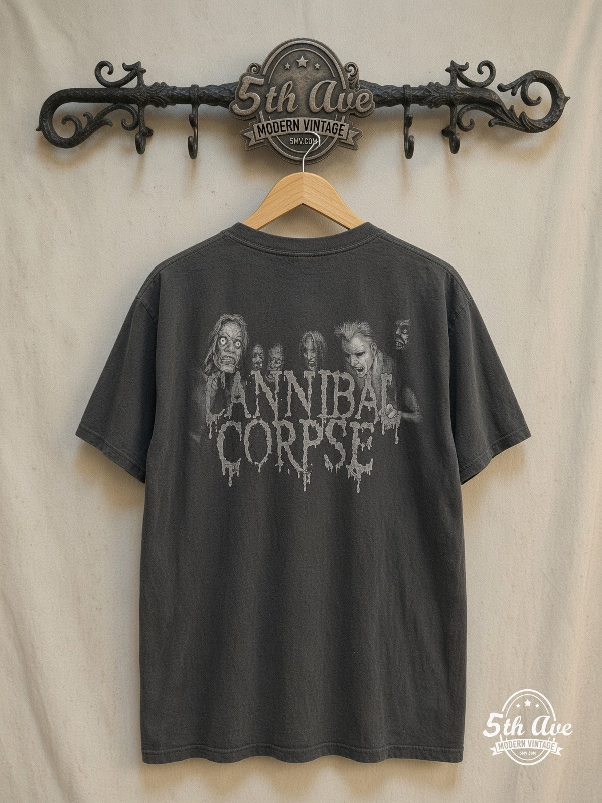 Cannibal Corpse – Butchered at Birth – Vintage Band T-Shirt — back on locked cream ornate 5th Ave rack