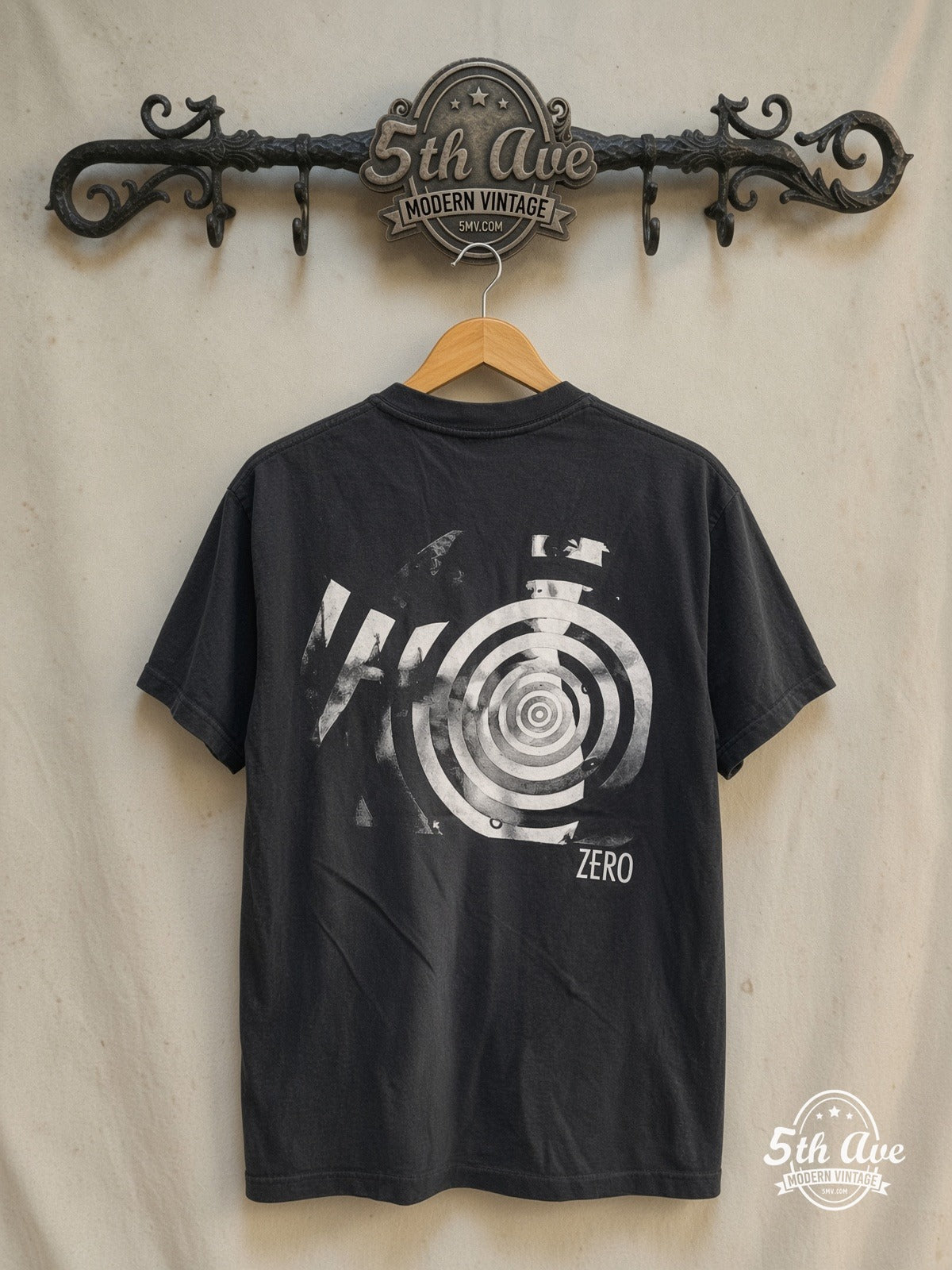 The Smashing Pumpkins – Zero Figure Concentric Circle Back – Vintage Band T-Shirt — back on locked cream ornate 5th Ave rack