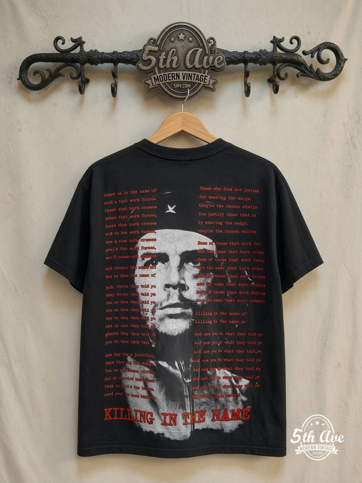 Rage Against the Machine – Killing in the Name All-Over Print – Vintage Band T-Shirt — back on locked cream ornate 5th Ave rack