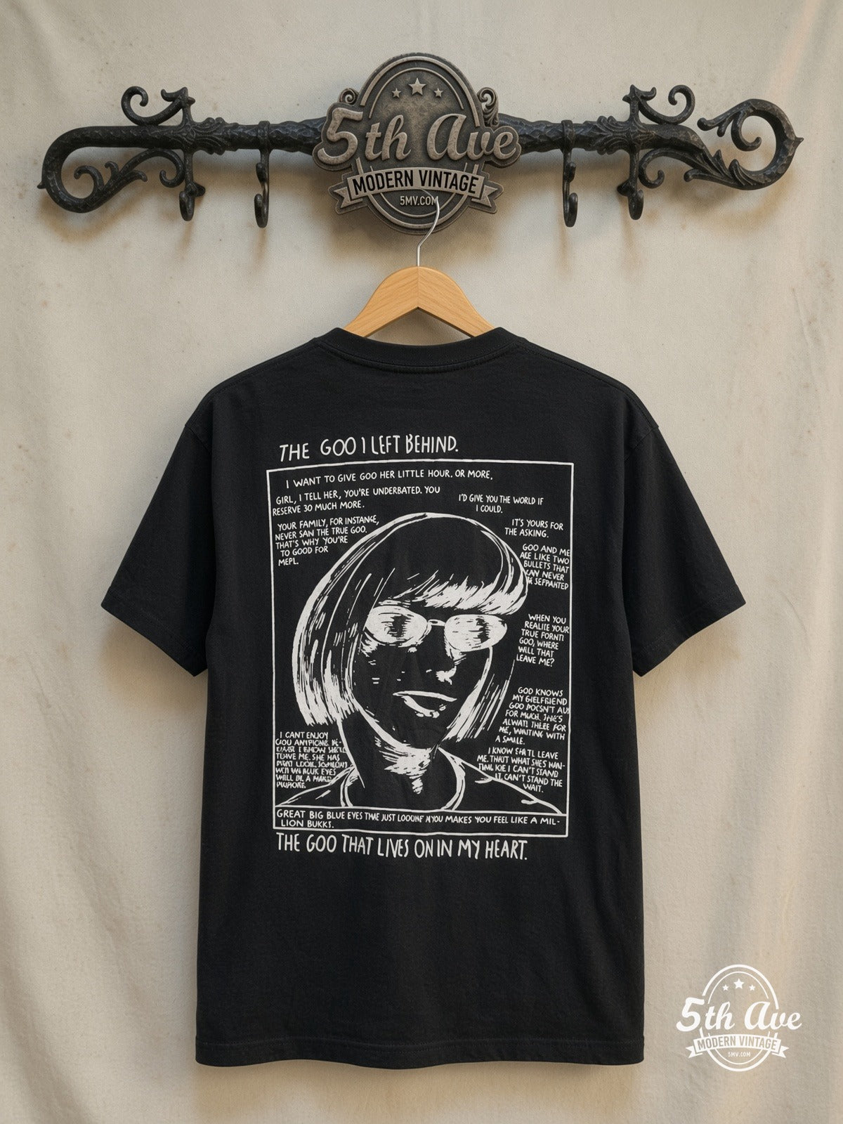Sonic Youth – The Goo' I Left Behind – Vintage Band T-Shirt — back on locked cream ornate 5th Ave rack
