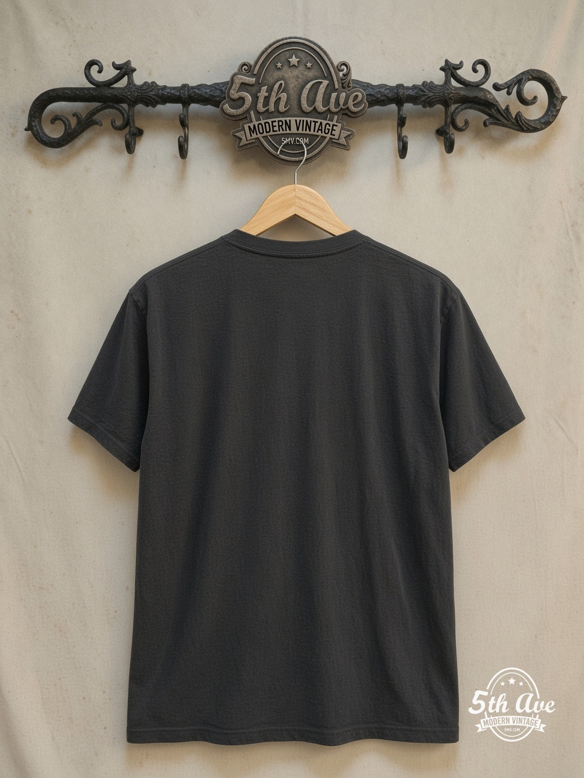 Motörhead – Iron Fist Tour 1982 – Vintage Band T-Shirt — back on locked cream ornate 5th Ave rack