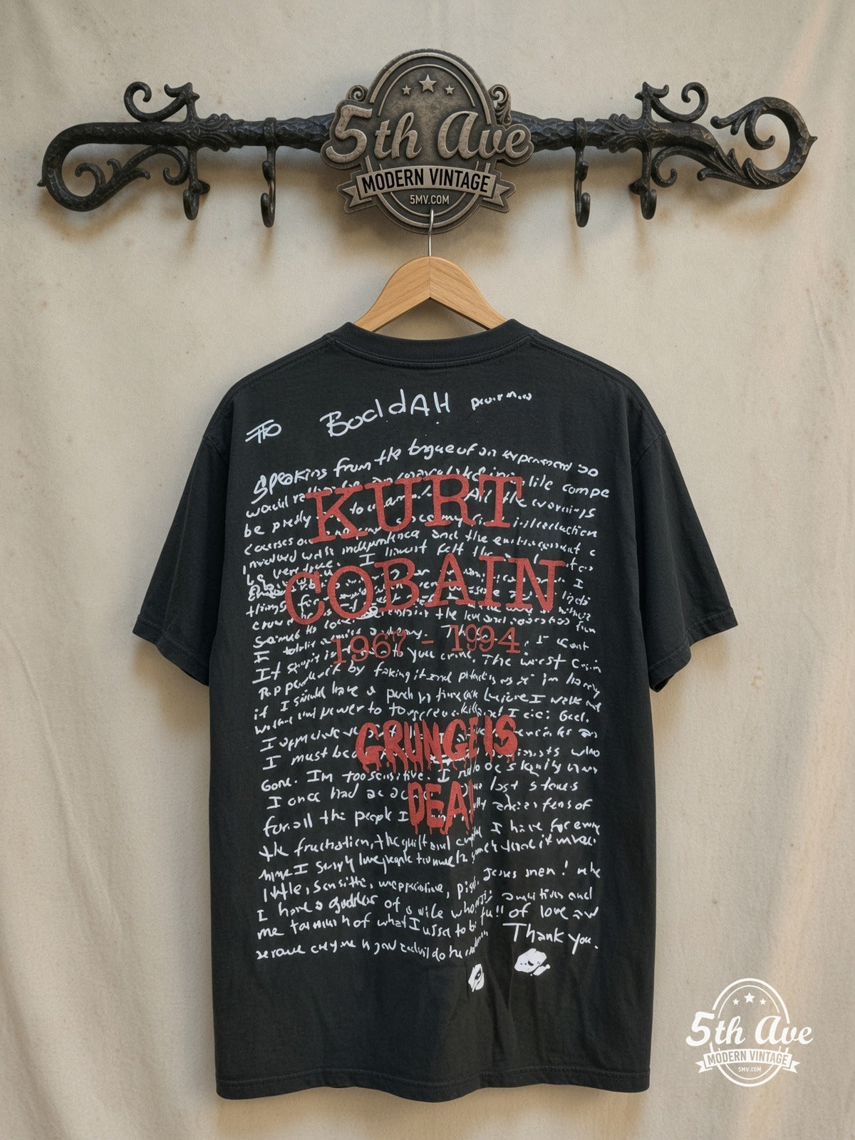 Nirvana – Nevermind Grunge Is Dead – All Over Print – Vintage Band T-Shirt — back on locked cream ornate 5th Ave rack